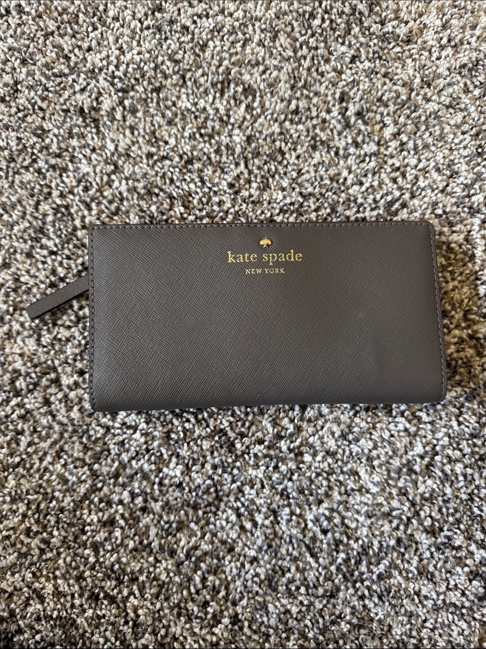 kate spade black zip-around Saffiano leather wallet with gold logo